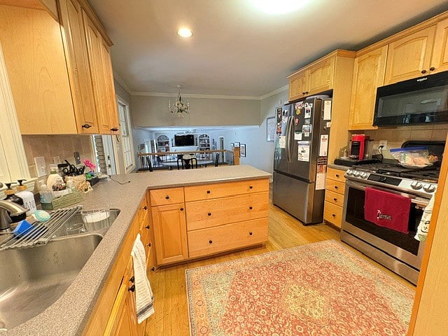 Complete kitchen with Nespresso coffee maker and selection of coffee pods, hot water dispenser, microwave, gas stove, dishwasher, large refrigerator & ice maker.