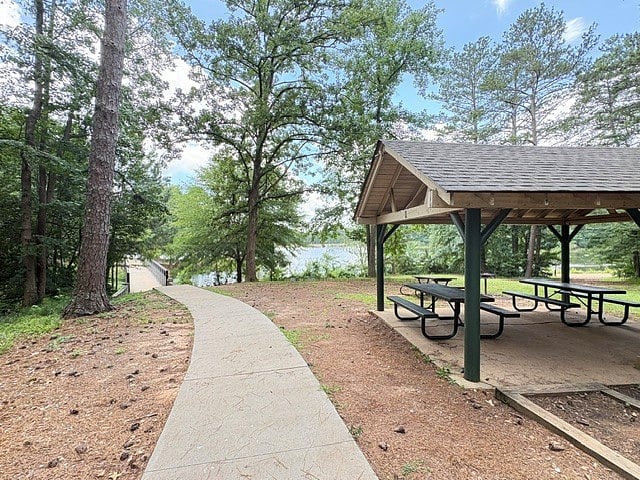Lake amenities: gazebos, benches, swings and bridges. The larger trail around the lake is roughly 1.3 miles.