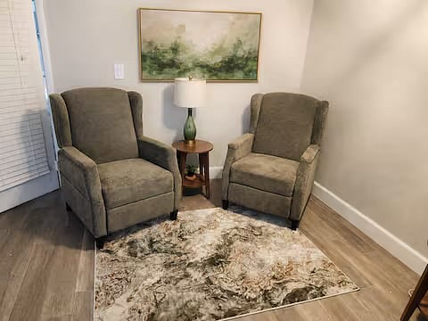 Primary bedroom sitting/tv area
