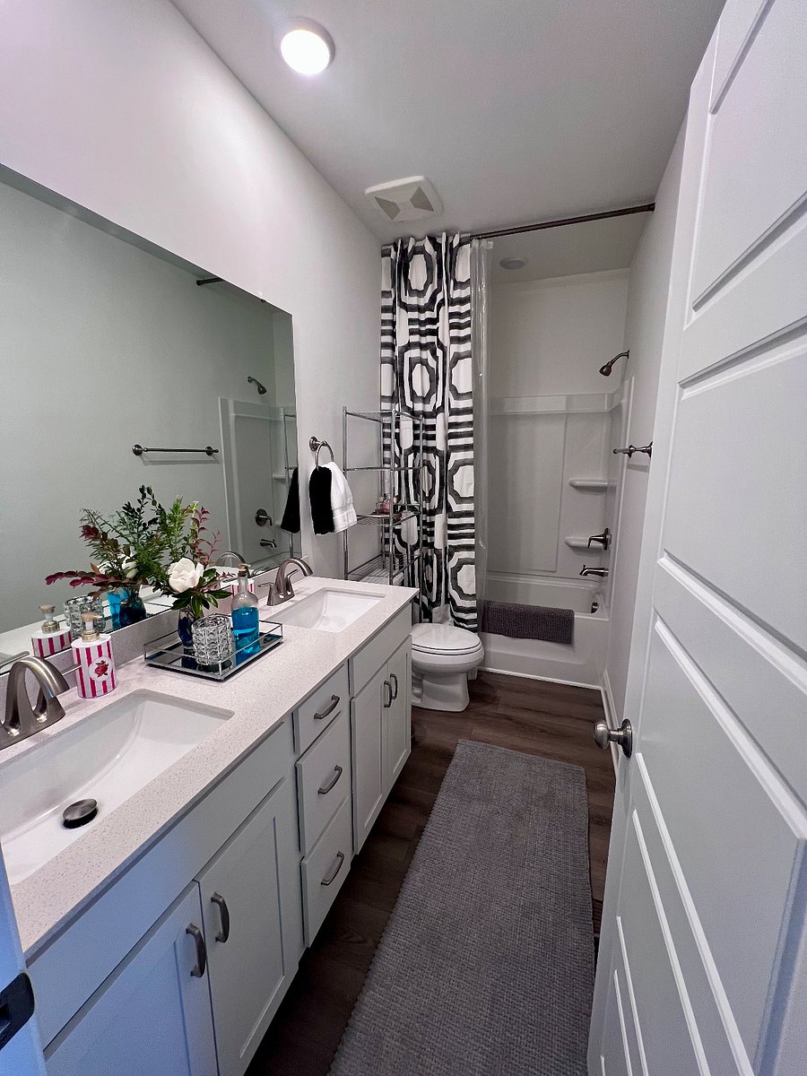 Private bathroom with all cleaning supplies, toiletries, common OTC meds, shower caps, hair ties, hair brushes, hair spray, hair dryer, razors, deodorant, and much more