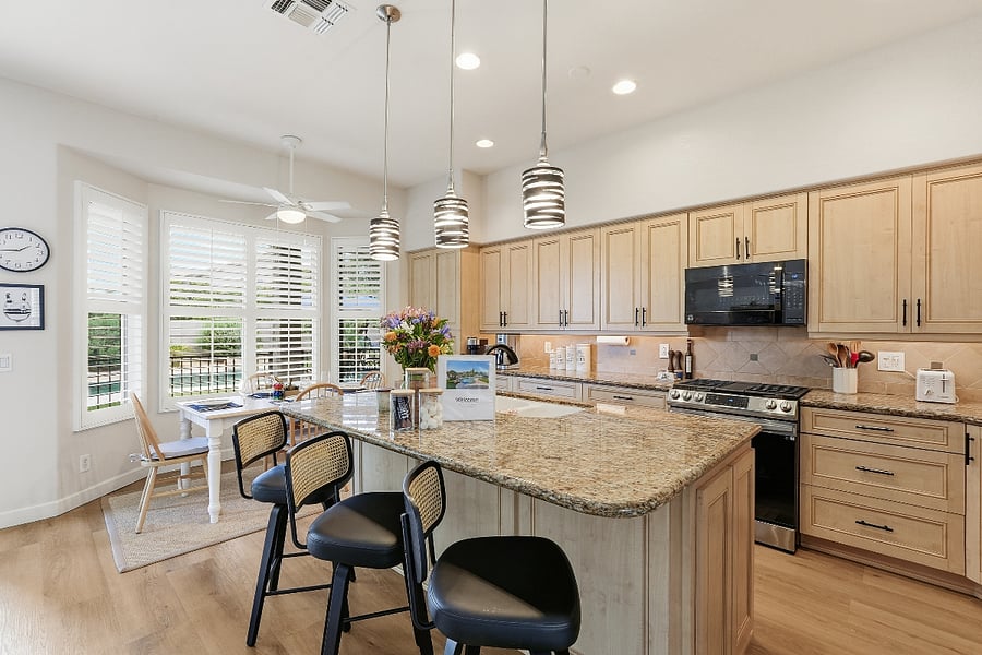 Completely furnished kitchen incuding coffeepot, Nespresso with foamer, toaster, stand mixer, air fryer, food processor, and more.