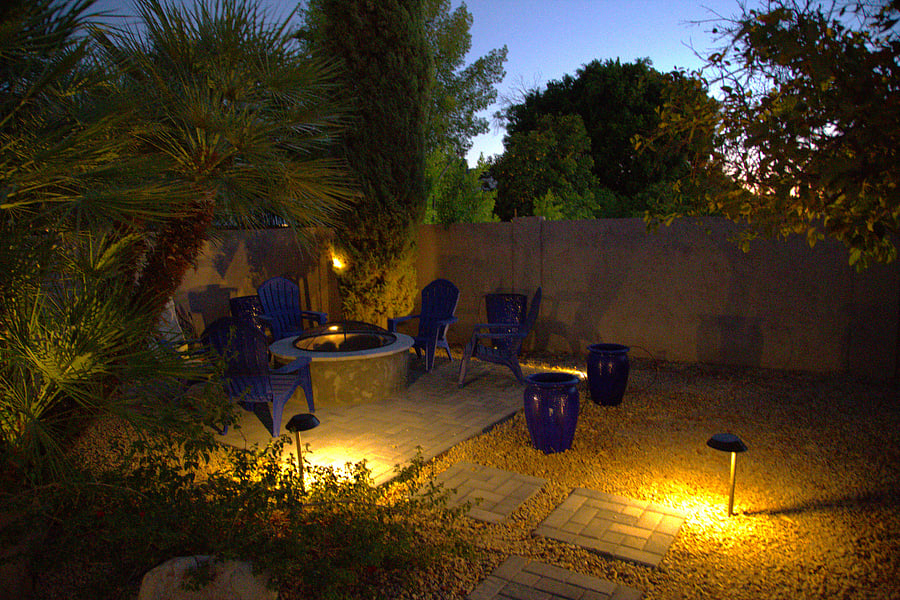Solar lights add ambiance to the backyard when the sun goes down.