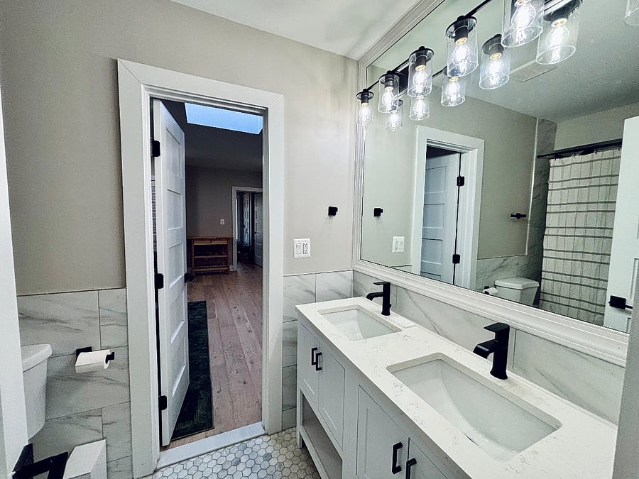 Full bathroom with double vanity