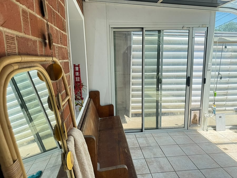 Seating available in the glass sun room