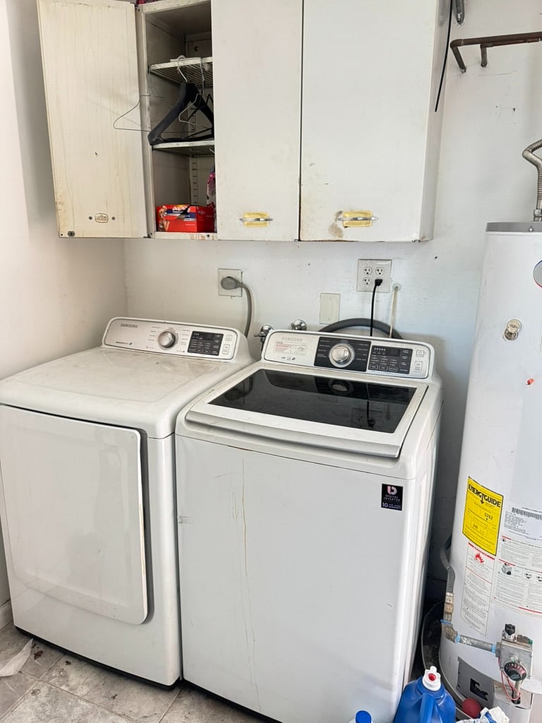 Washer and dryer on the property in a separate building to keep things cool in the house.