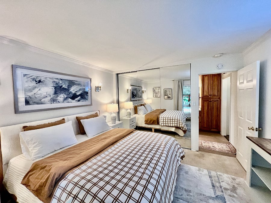 California King Bed, Large Mirrored Closet with Ikea PAX Closet system