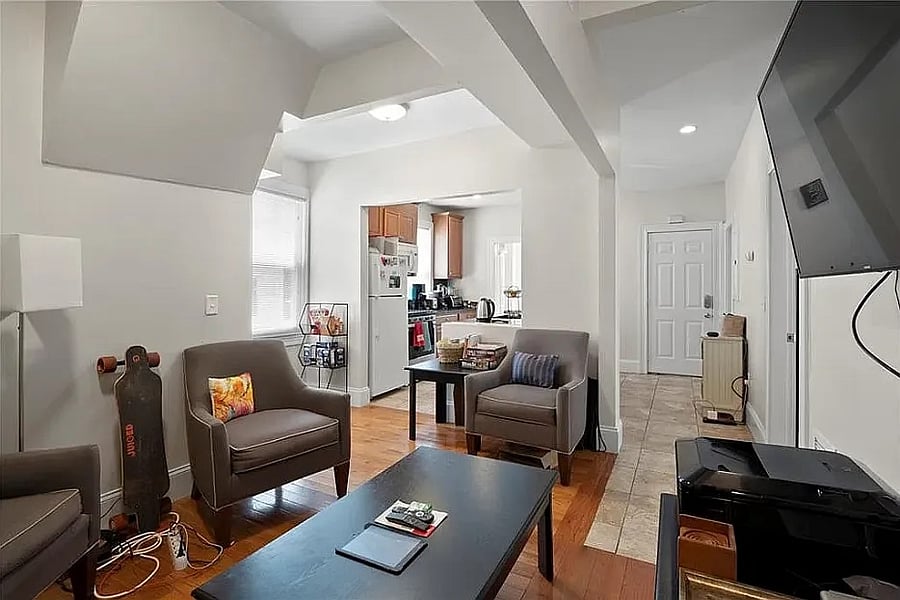 Living room looking into kitchen