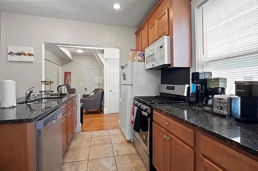 Kitchen looking into living room