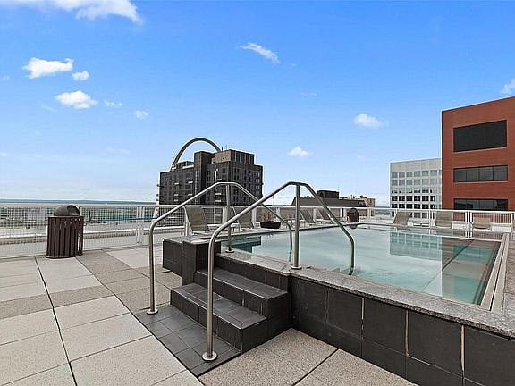 Rooftop Pool with Riverfront and Arch views
