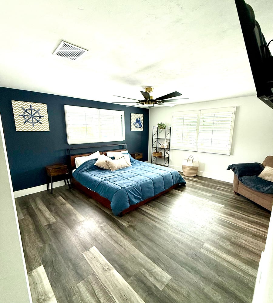Upstairs Master With King Bed and En Suite Bathroom and Mounted TV
