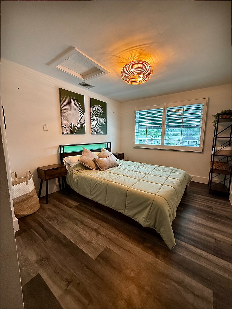 Upstairs Bedroom with Queen Bed with Mounted TV