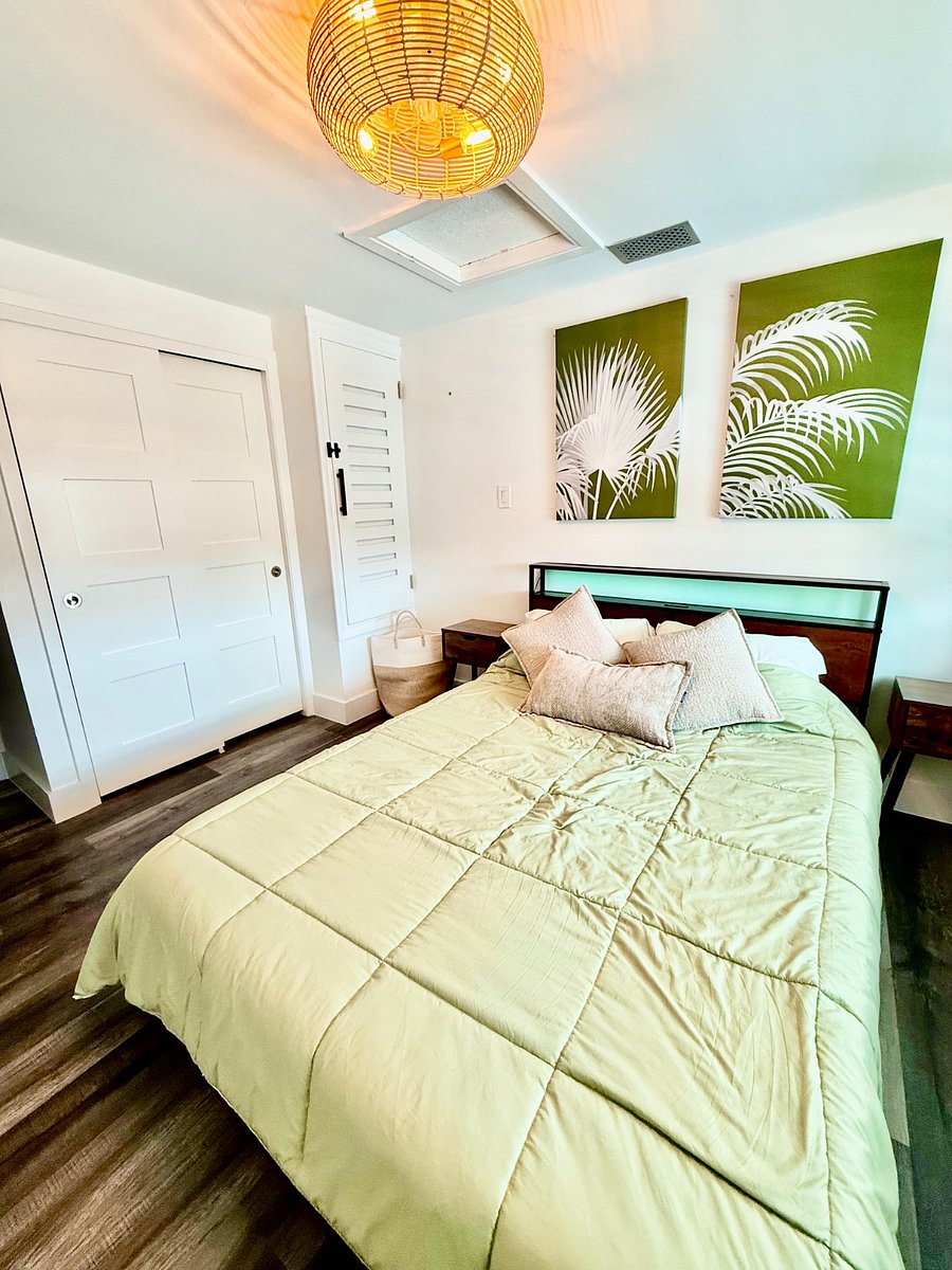 Upstairs Bedroom with Queen Bed with Mounted TV