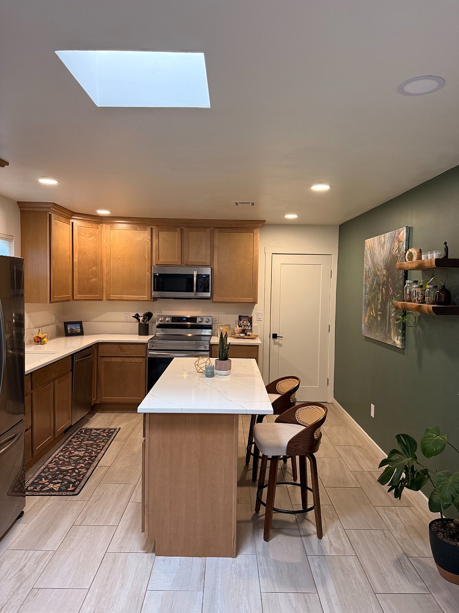 large kitchen with island seating for 2