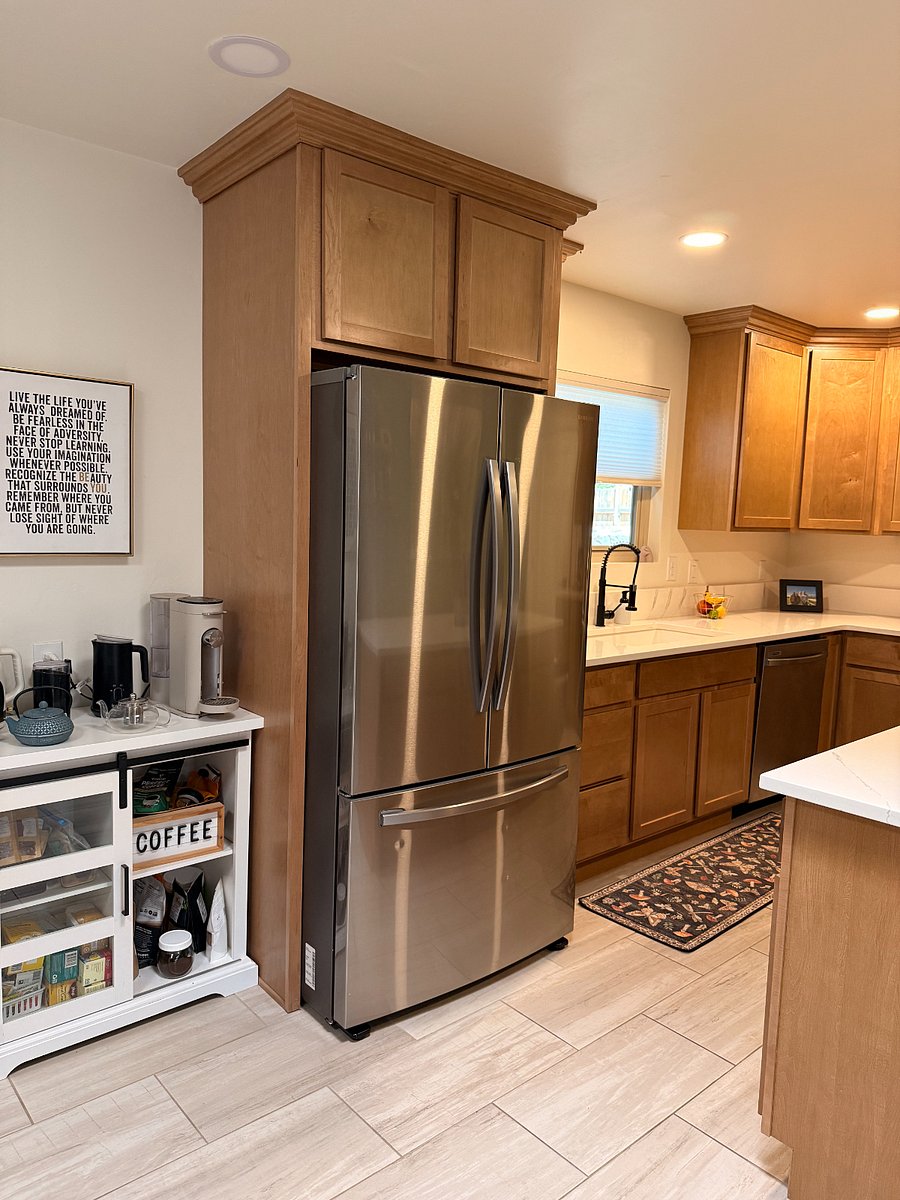 spacious kitchen with window to backyard
