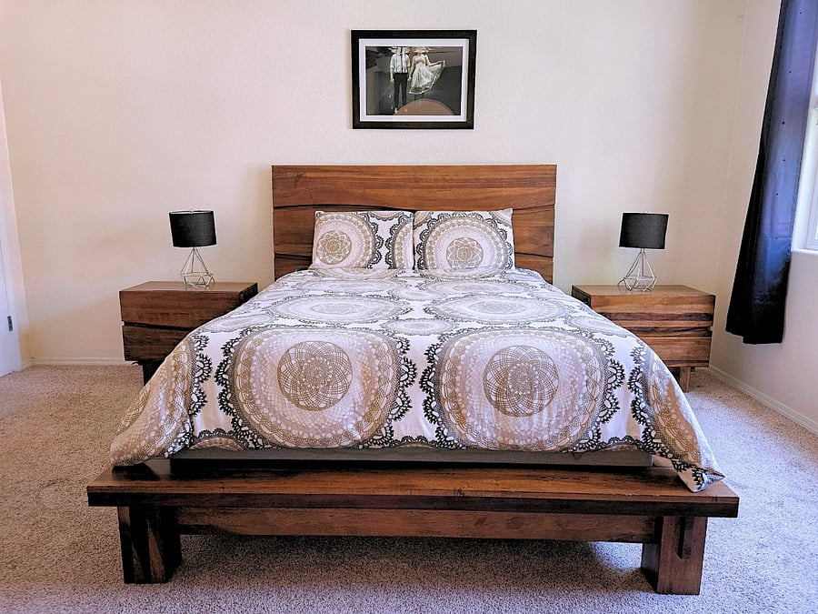 Tempurpedic Mattress with view of outdoor garden.