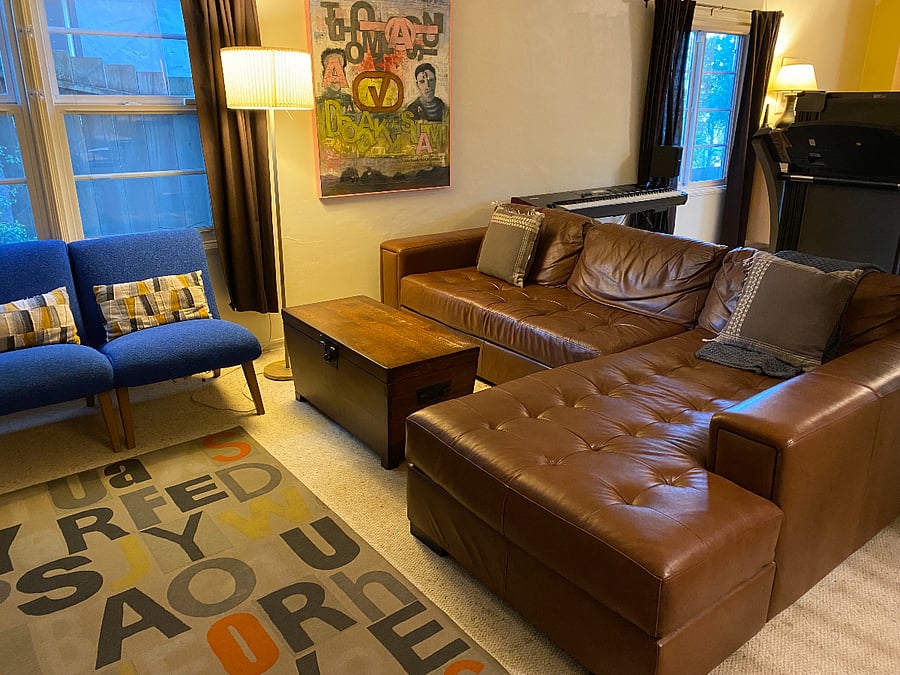 Separate Large Living Room with Comfy Leather Couch