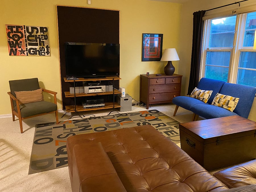 View of TV Space from Leather Couch in Living Room