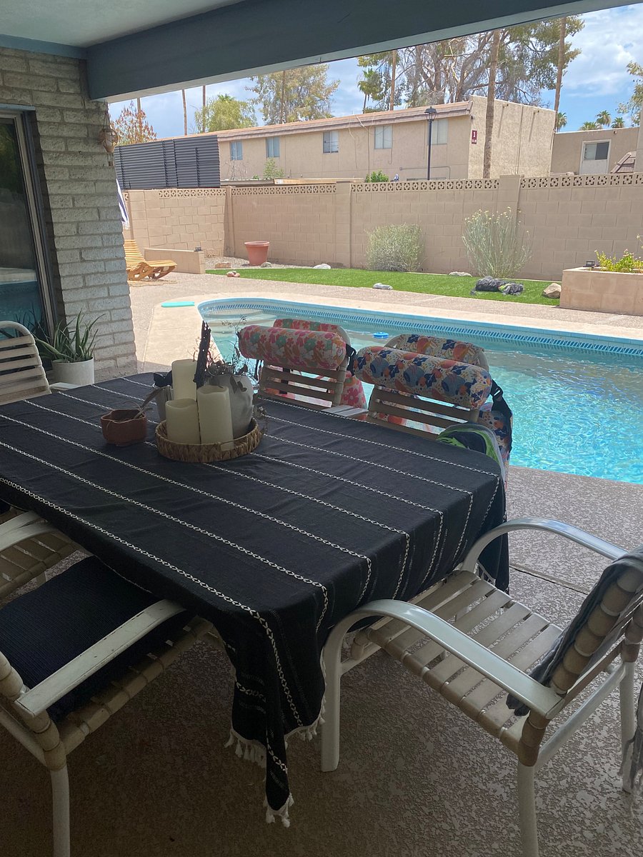 Large dining table and pool floats for you to enjoy.
