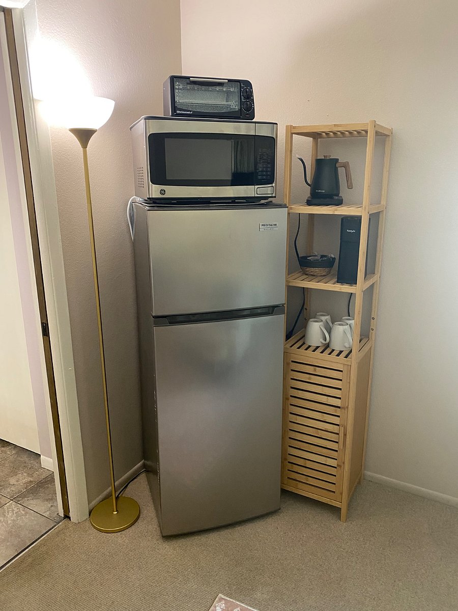 7.1 cubit fridge, microwave, toaster oven, kettle, keurig, and plenty more storage.