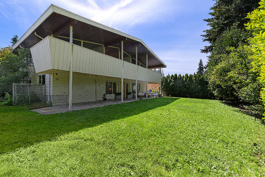 Large grassy area and covered firepit.