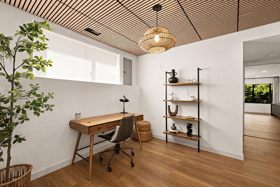 Private workspace with plenty of room to spread out, plus shelving, natural light, and a quiet environment for focused work.