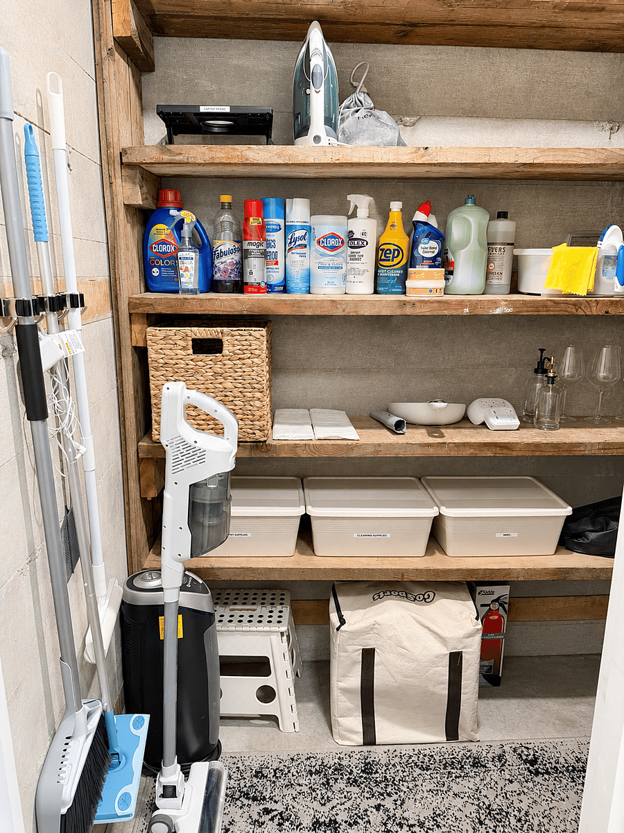 A stocked cleaning closet for you with vacuum, mop, iron, ironing board, stain removers, and cleaning supplies, plus Giant Jenga for enjoying the outdoor patio.