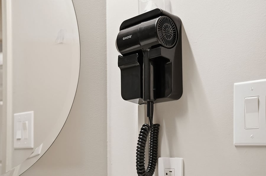 Spa inspired bathroom with provided hair dryer