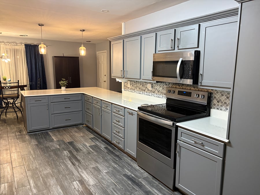 Quartz countertops flow through the inviting space. 