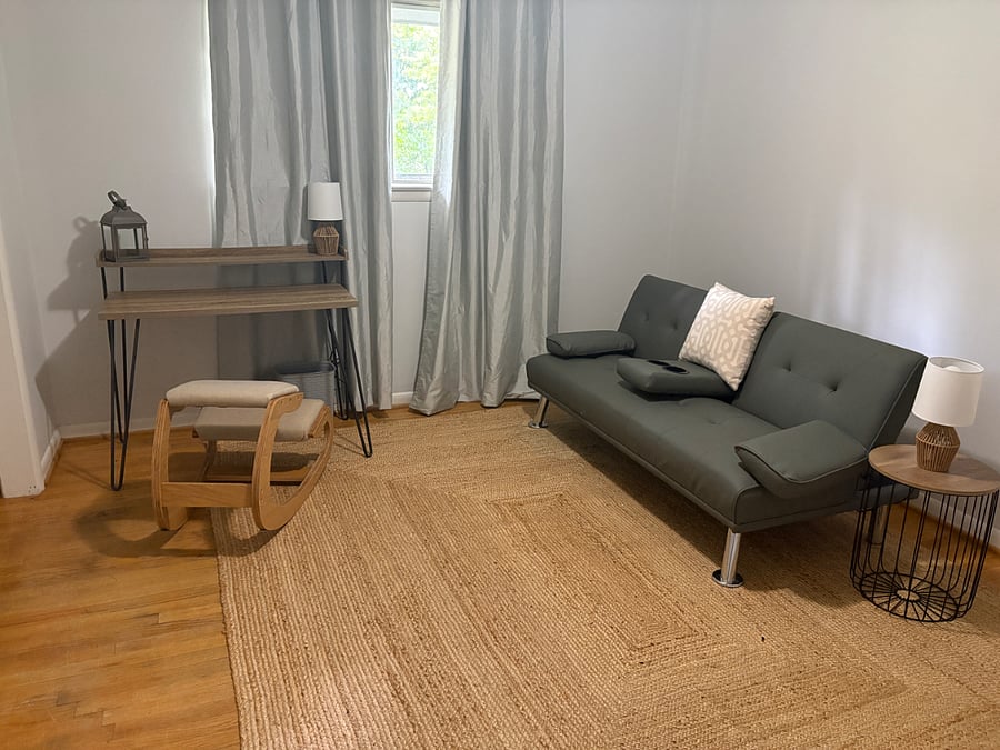 Third bedroom features a sleeper sofa. Full- size bed available upon request at booking. Desk and television create a nice space for work or relaxation. 