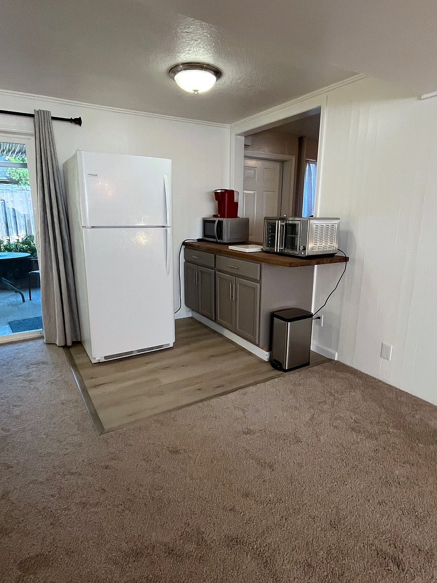 Full sized refrigerator, air fryer/oven, microwave, coffee maker