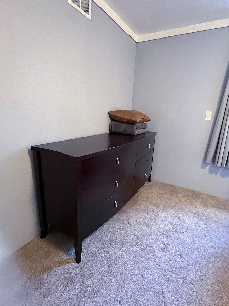 Large dresser. Towels and linens are in lower drawers.