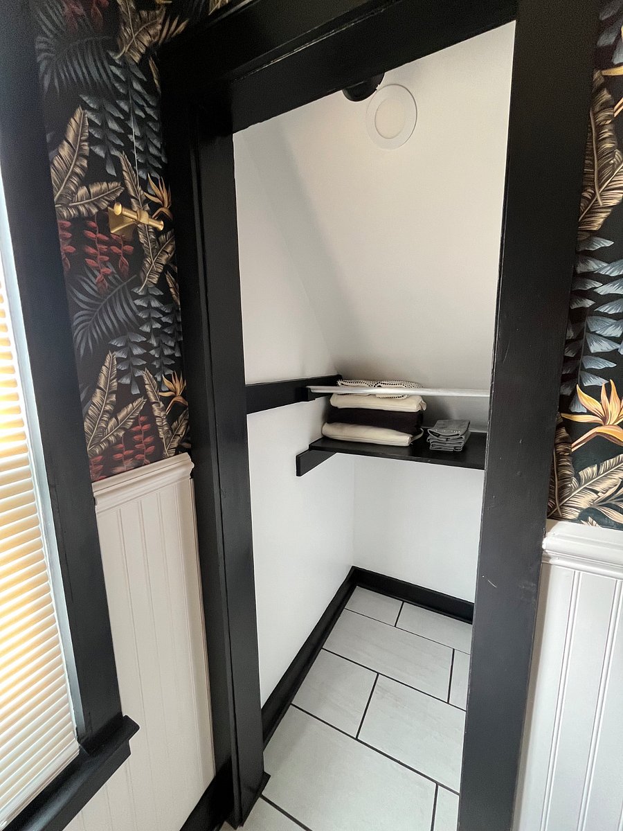 attached linen closet inside bathroom