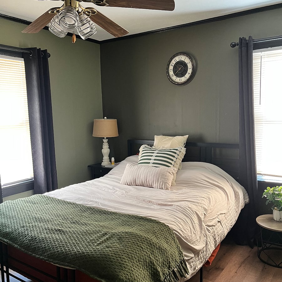 Tempur-pedic Queen bed and black out curtains in first floor bedroom