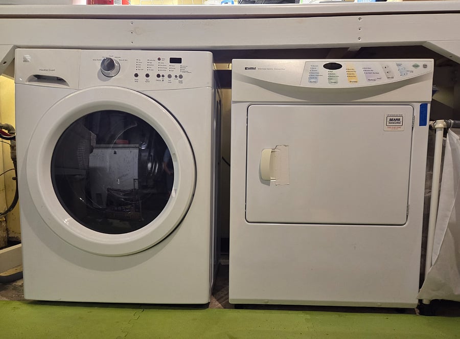 Washer/dryer in basement.