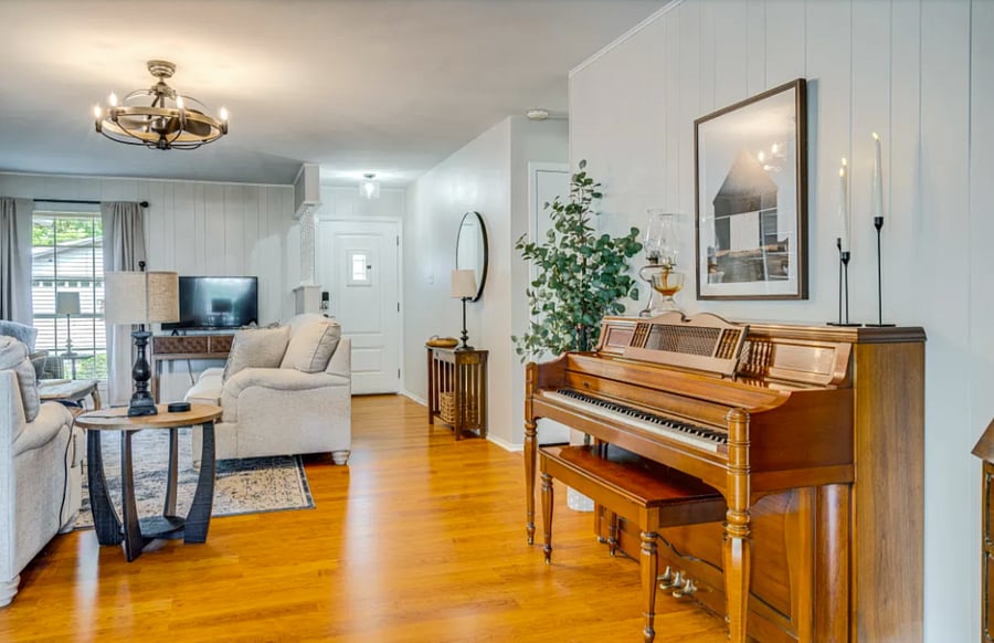 Living Room with TV and Upright Piano