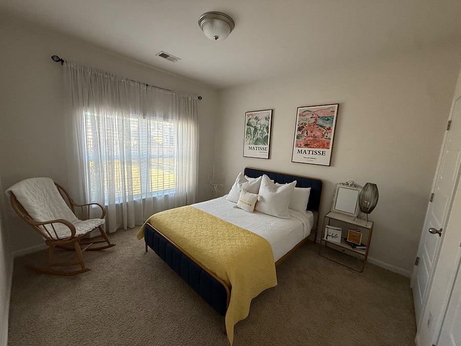 Downstairs bedroom with bathroom attached.
