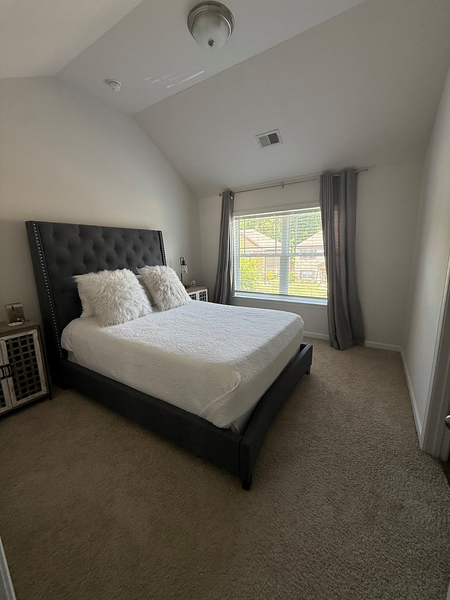 Bedroom upstairs with walk in closet and private bath
