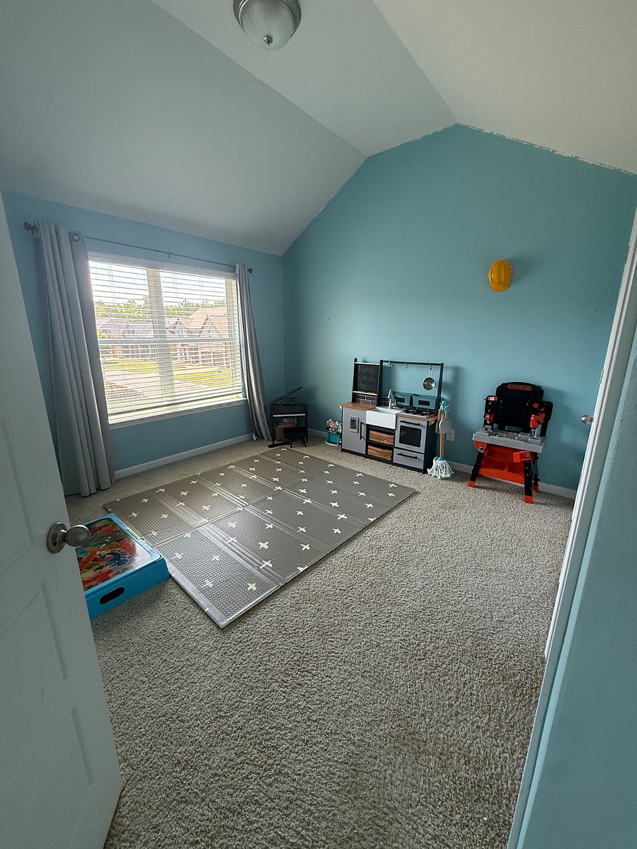 Bedroom/playroom with jack and Jill bath