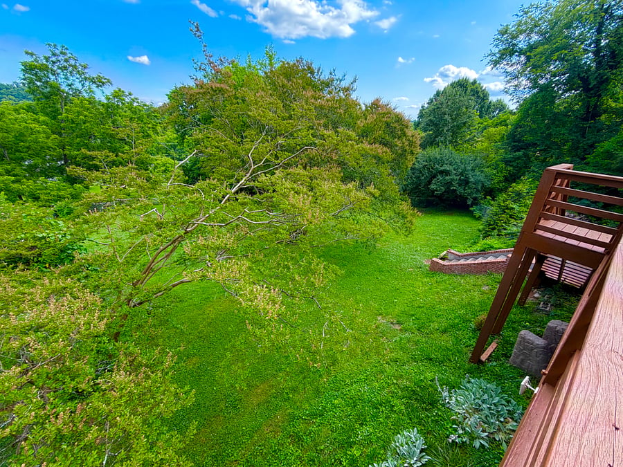 Deck overlooks the half-acre fenced back yard - perfect for pets!