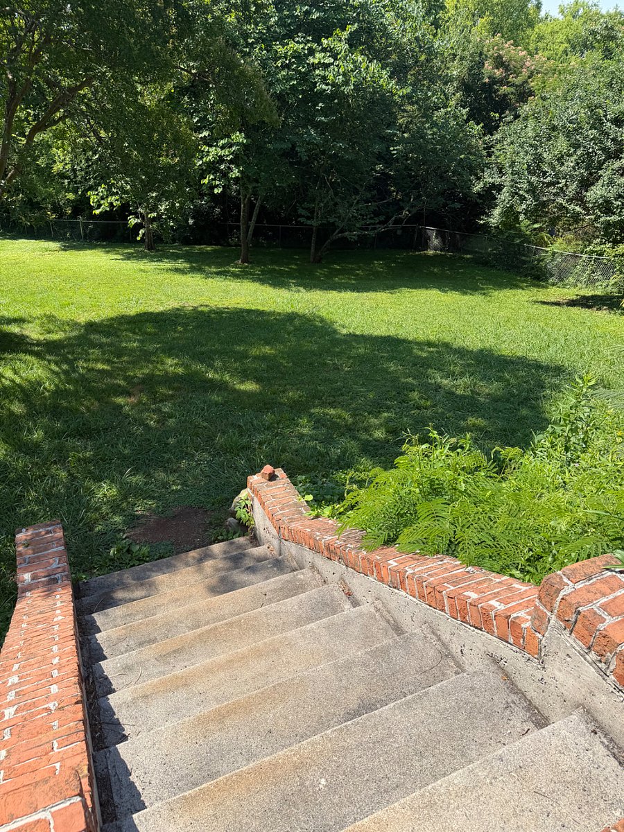 The half-acre+ back yard is perfect for relaxing, cooking out, or playing with pets.