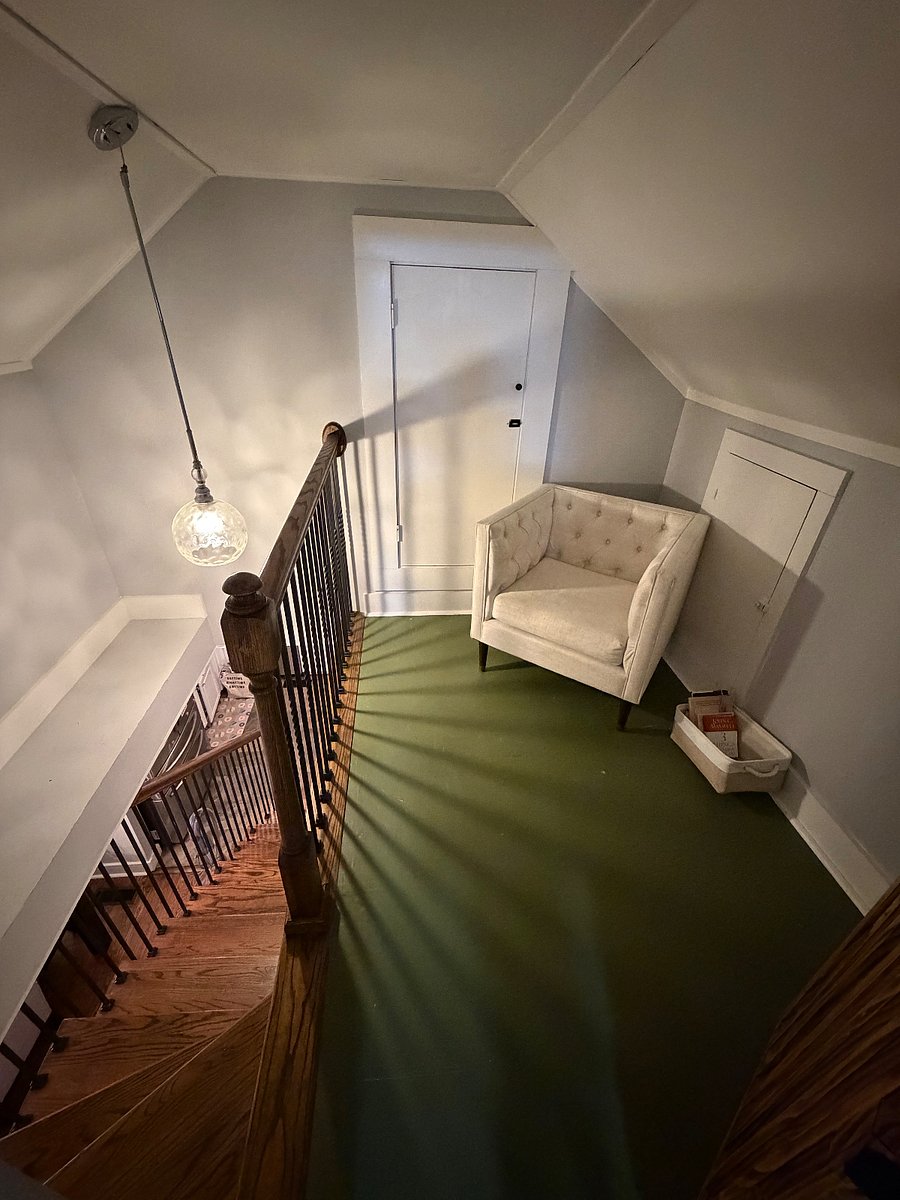 Reading nook at the top of the stairs by the kitchen.