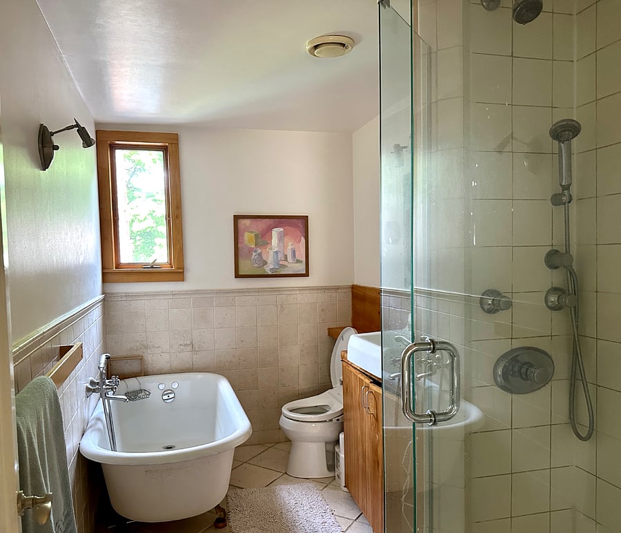2nd floor bathroom with tub and shower