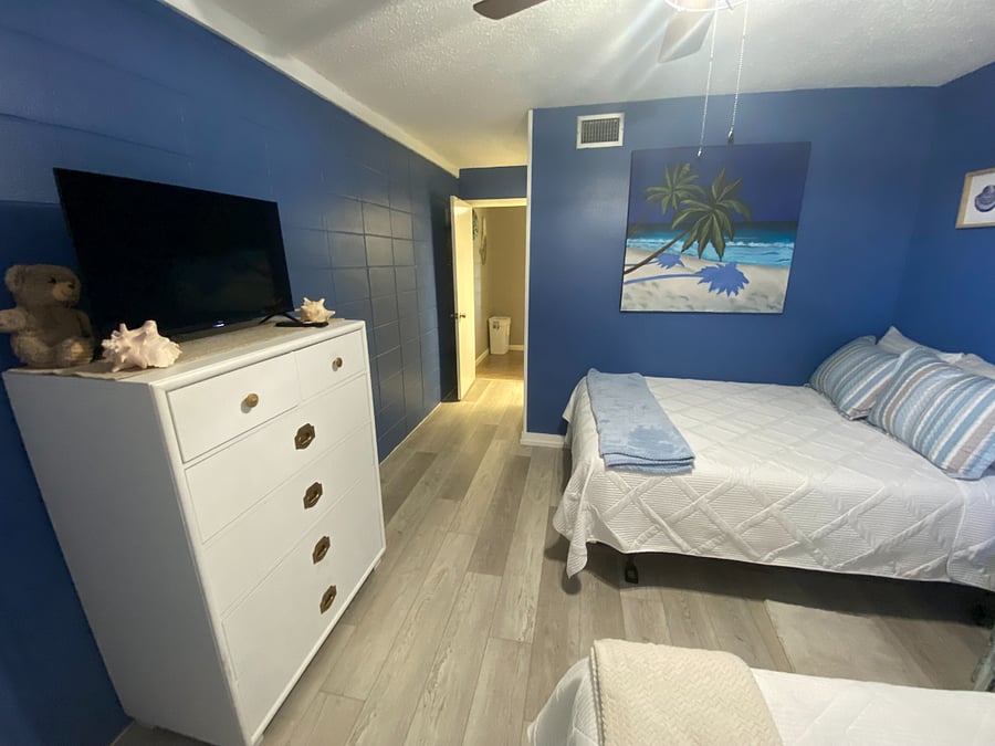 2nd room, 2 full beds, dresser, nightstand, lamp, tv