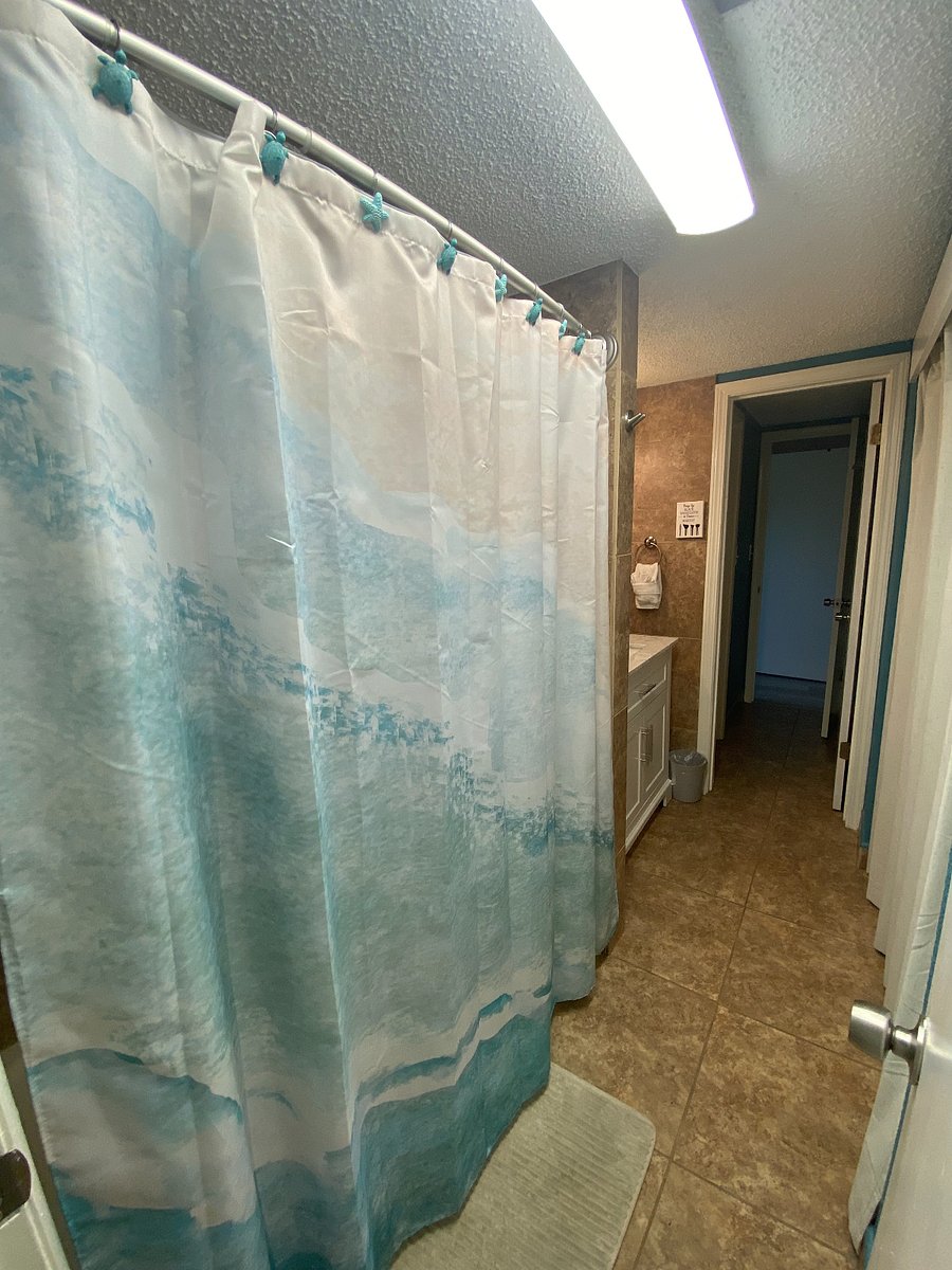 Jack & Jill style bath area with doors that lead to either room.