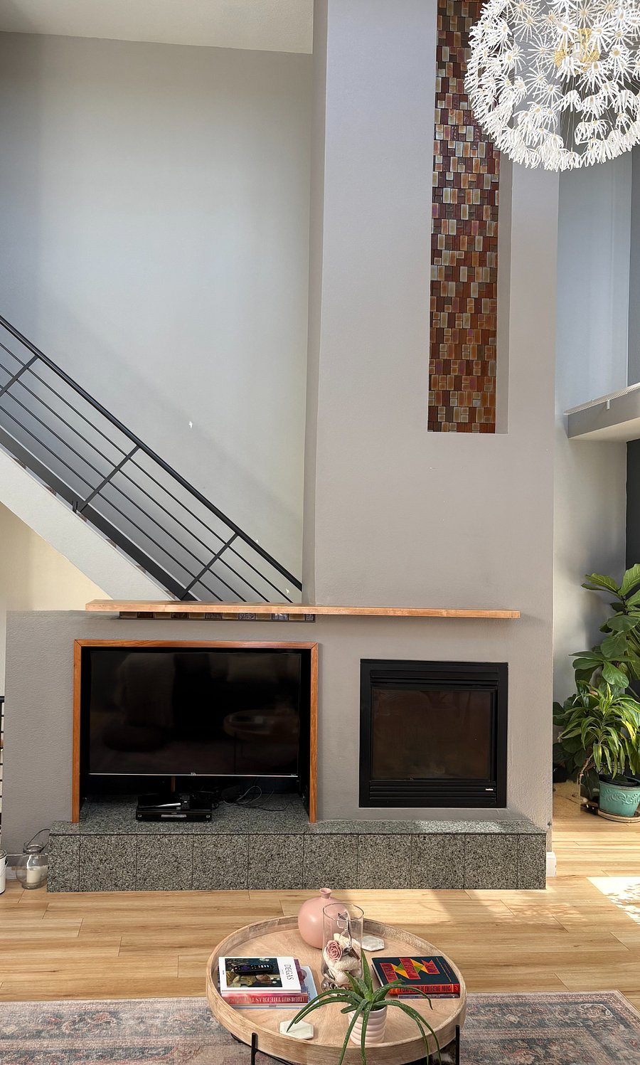Gas fireplace and TV, stairs to 3rd floor