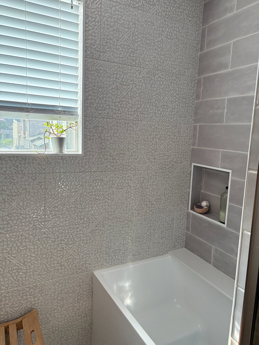 Soaking/plunge tub in third floor shower