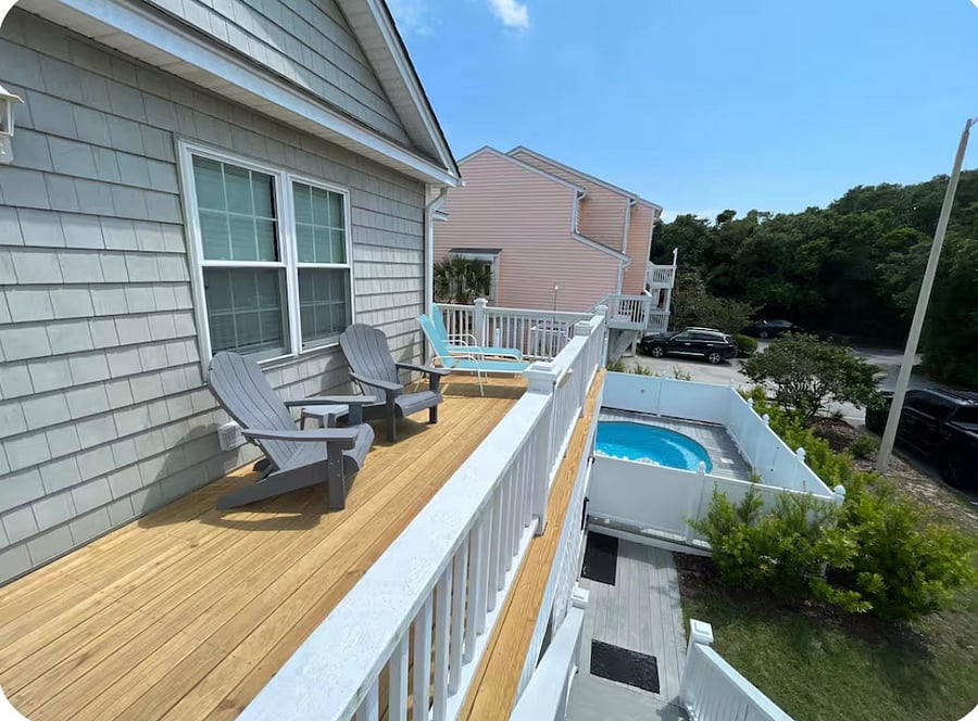 Back deck overlooking pool