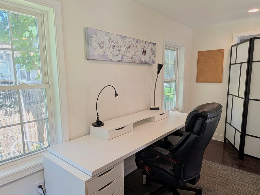 Home Office (behind shelving unit and room divider in flex room)