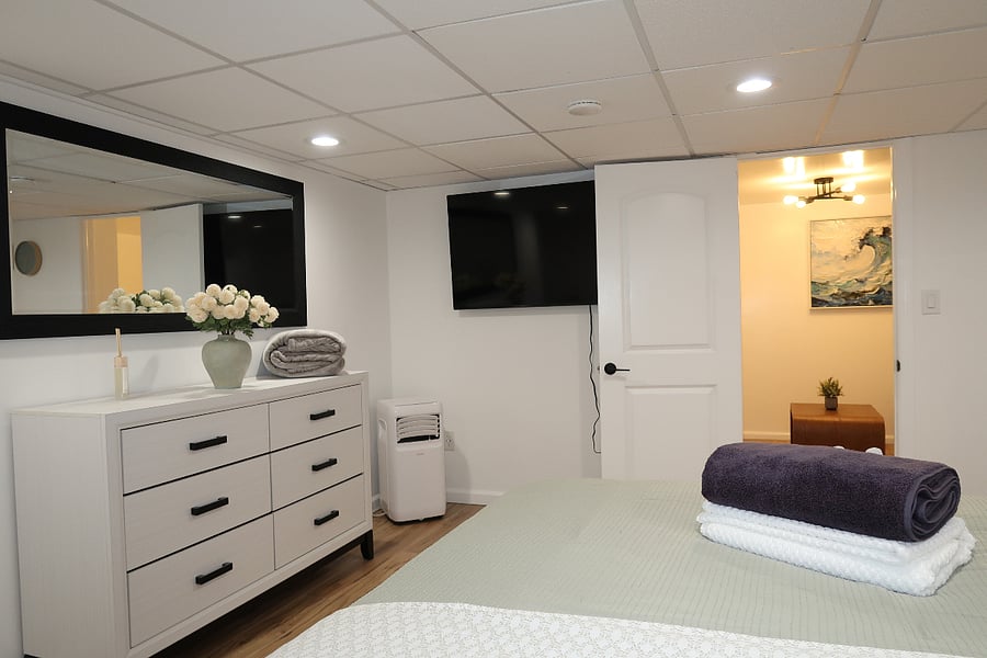First bedroom. You can see the attached bonus theatre room from the view.