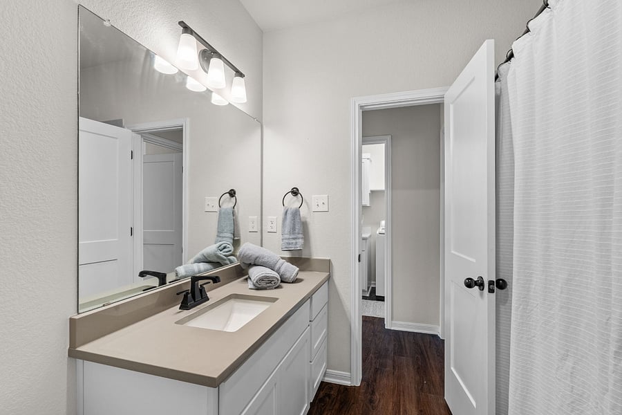 Guest Bathroom - Facing door to laundry.
